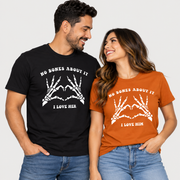 TeeLikeYours matching Halloween couple T-shirts featuring “No Bones About It” skeleton hand heart designs, with “I Love Her” and “I Love Him” prints
