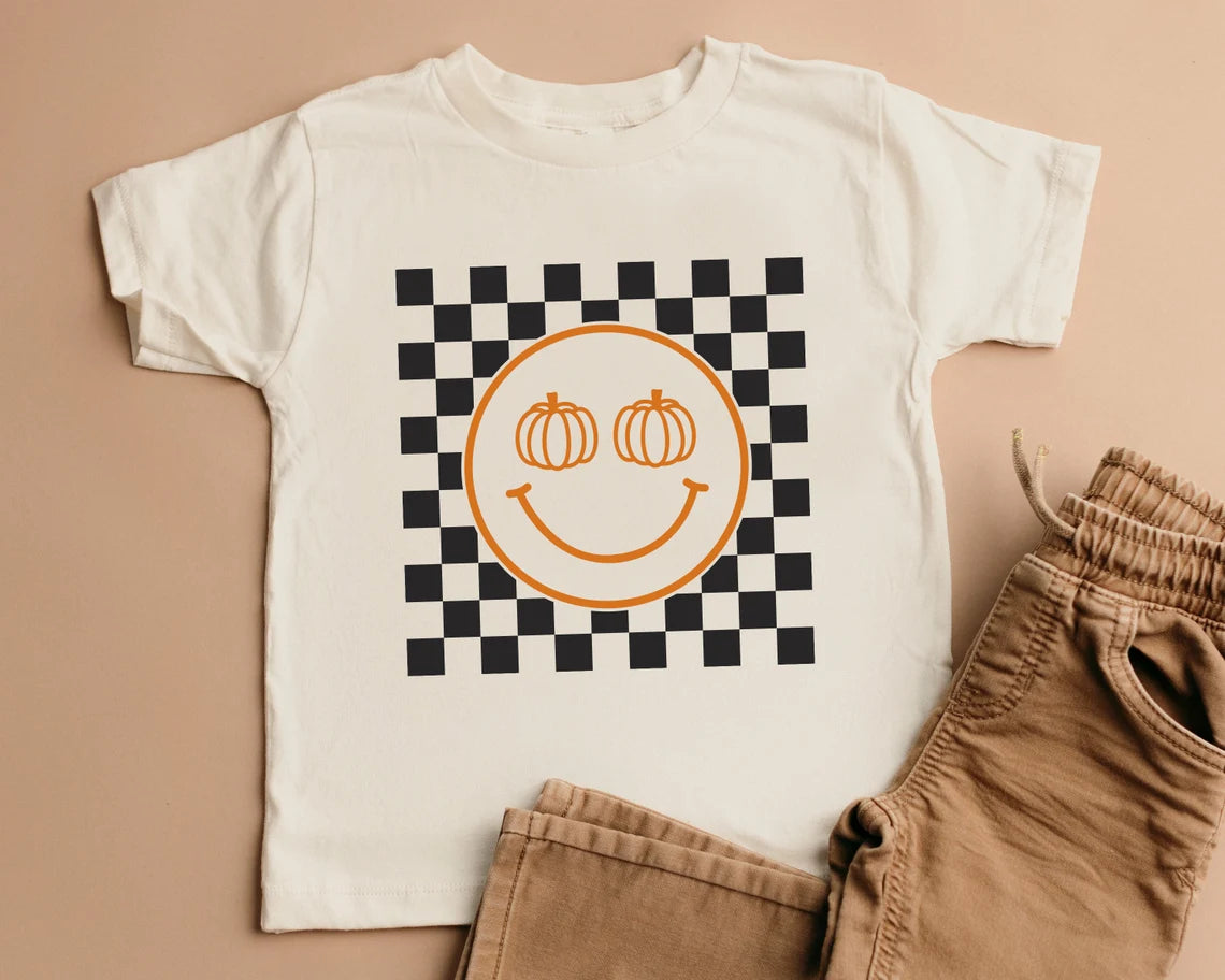 Pumpkin Checkered Smiley Face T-shirt | Halloween T-shirt for Kids | Halloween Toddler Tee | Pumpkin Baby Shirt | Fall Retro Checkered baby t-shirt
