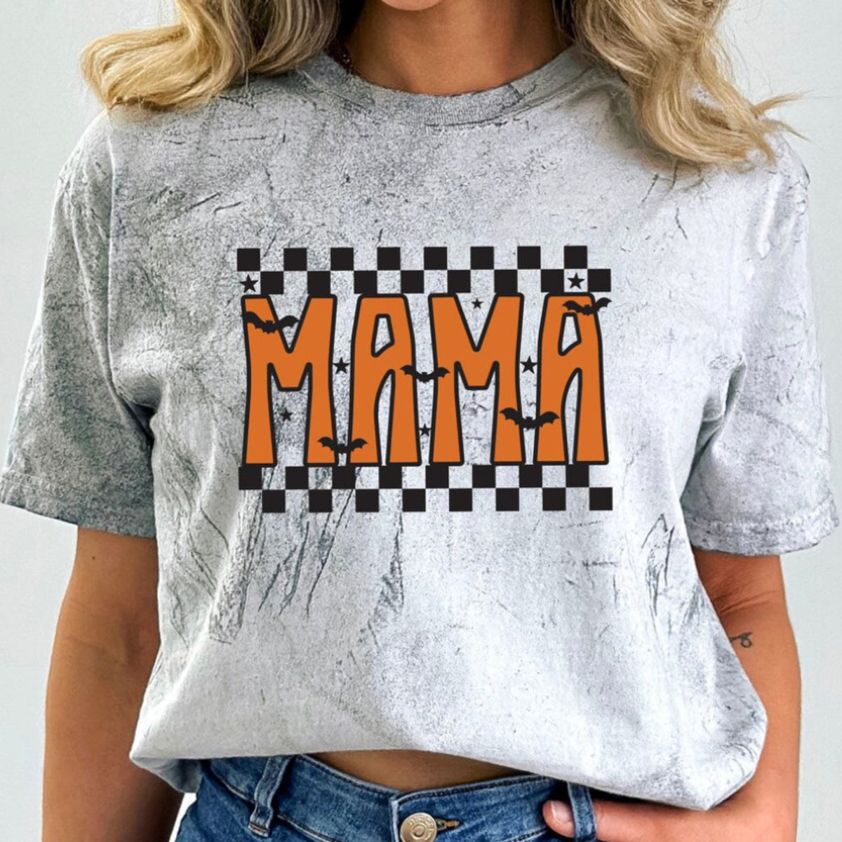 Checkered Fall Mama Halloween shirt with orange Mama graphic, bats, and checkerboard design on a garment-dyed t-shirt