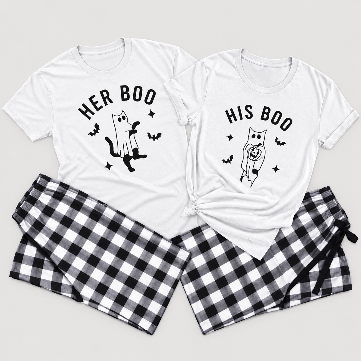 Her Boo and His Boo matching Halloween pajama sets with white t-shirts featuring cat ghost designs and black-and-white checkered flannel pants on a light gray background