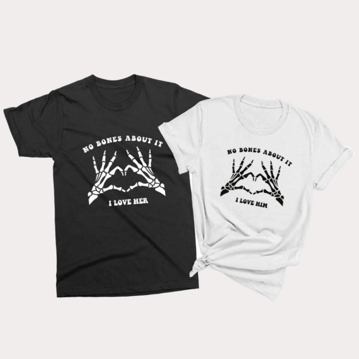 Matching Halloween couple T-shirts featuring skeleton hand designs with “No Bones About It” and “I Love Him” and “I Love Her” messages