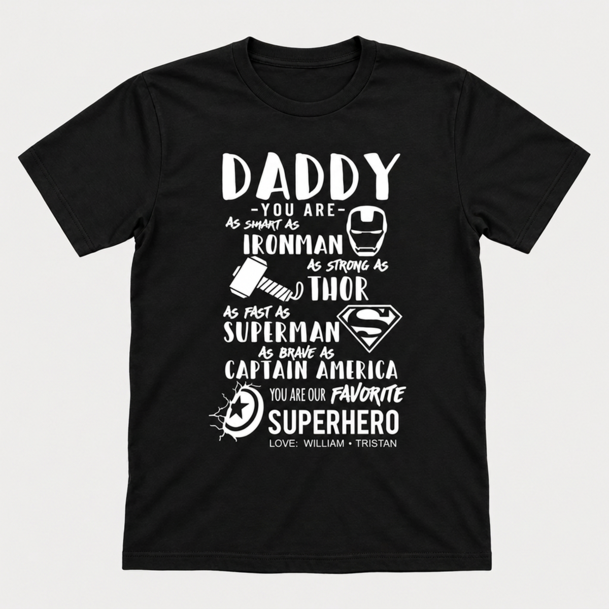 Black Daddy T-shirt with white superhero graphics and “You are our favorite superhero” text, personalized with kids' names.