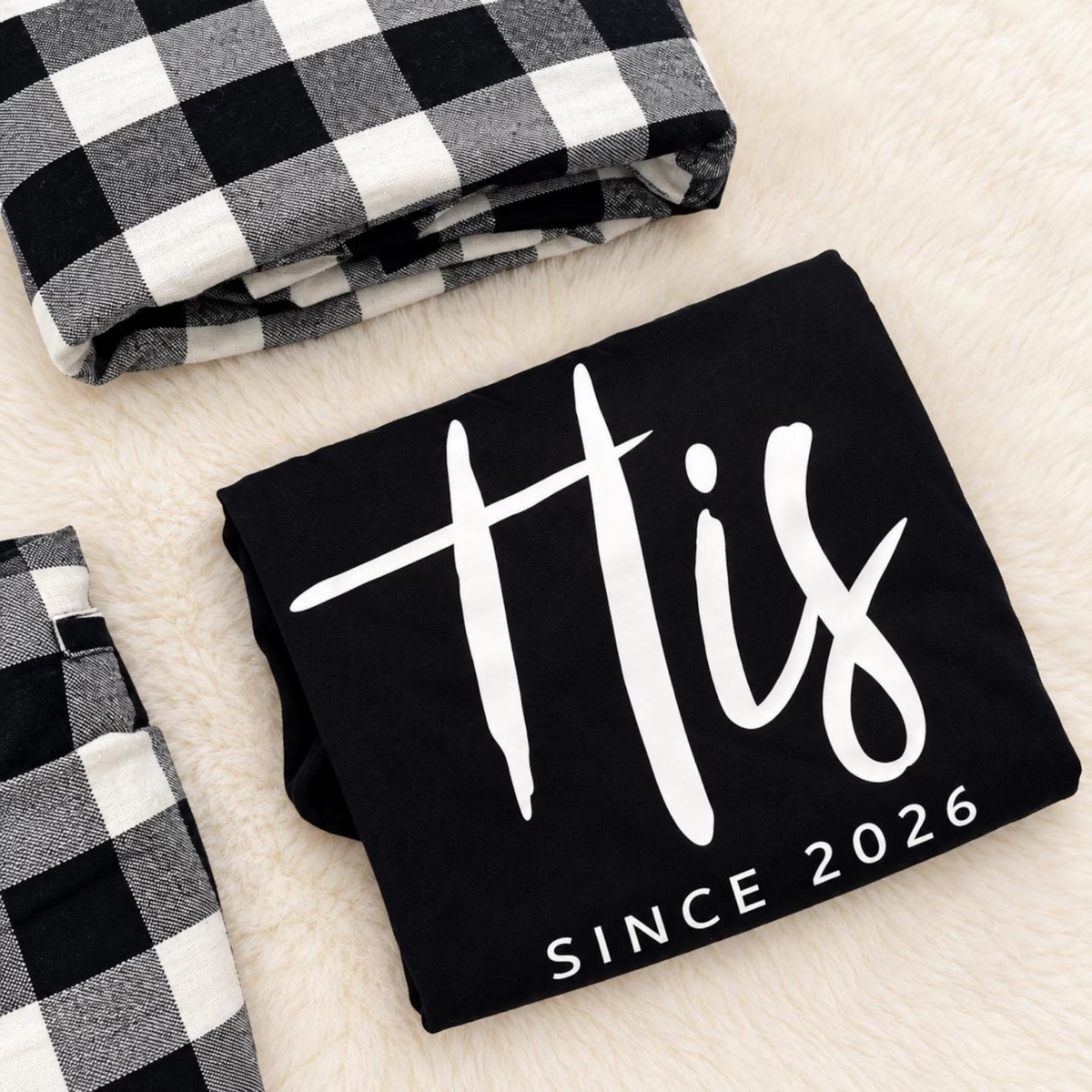 Close-up of a personalized His long-sleeve pajama shirt featuring custom anniversary-year text, paired with matching buffalo plaid flannel pajama pants.