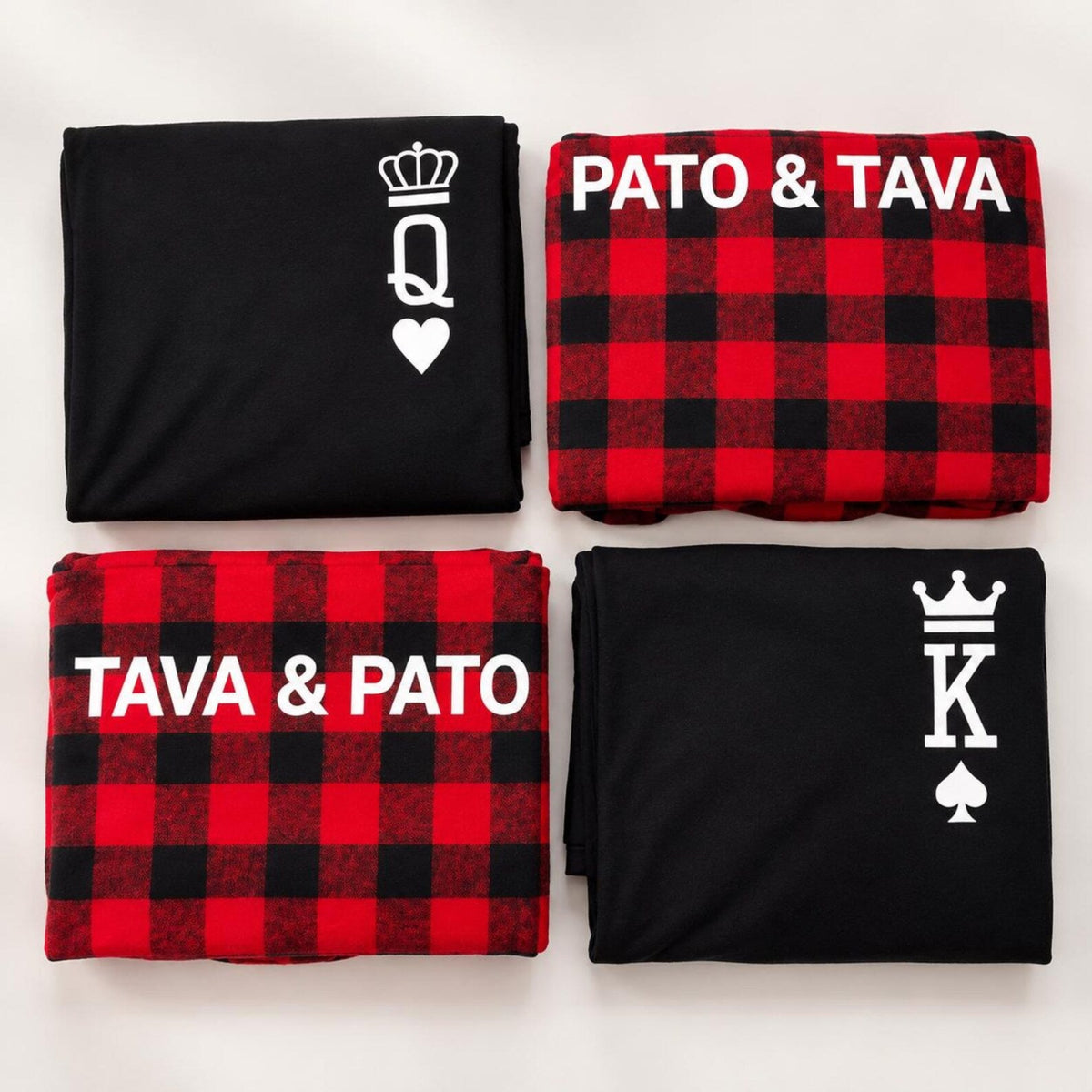 Personalized King and Queen matching Christmas pajamas featuring royal crown and playing card designs on folded T-shirts and flannel pajama pants customized with the names Pato and Tava.