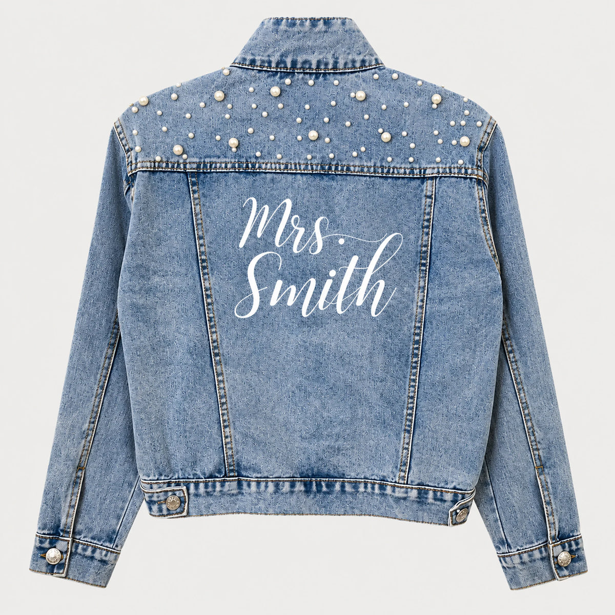 Personalized pearl bridal denim jacket with custom Mrs. design on the back