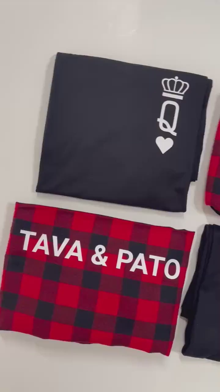 Load video: King &amp; Queen matching Christmas pajamas for couples with custom names printed on the red-black buffalo plaid PJs pants.