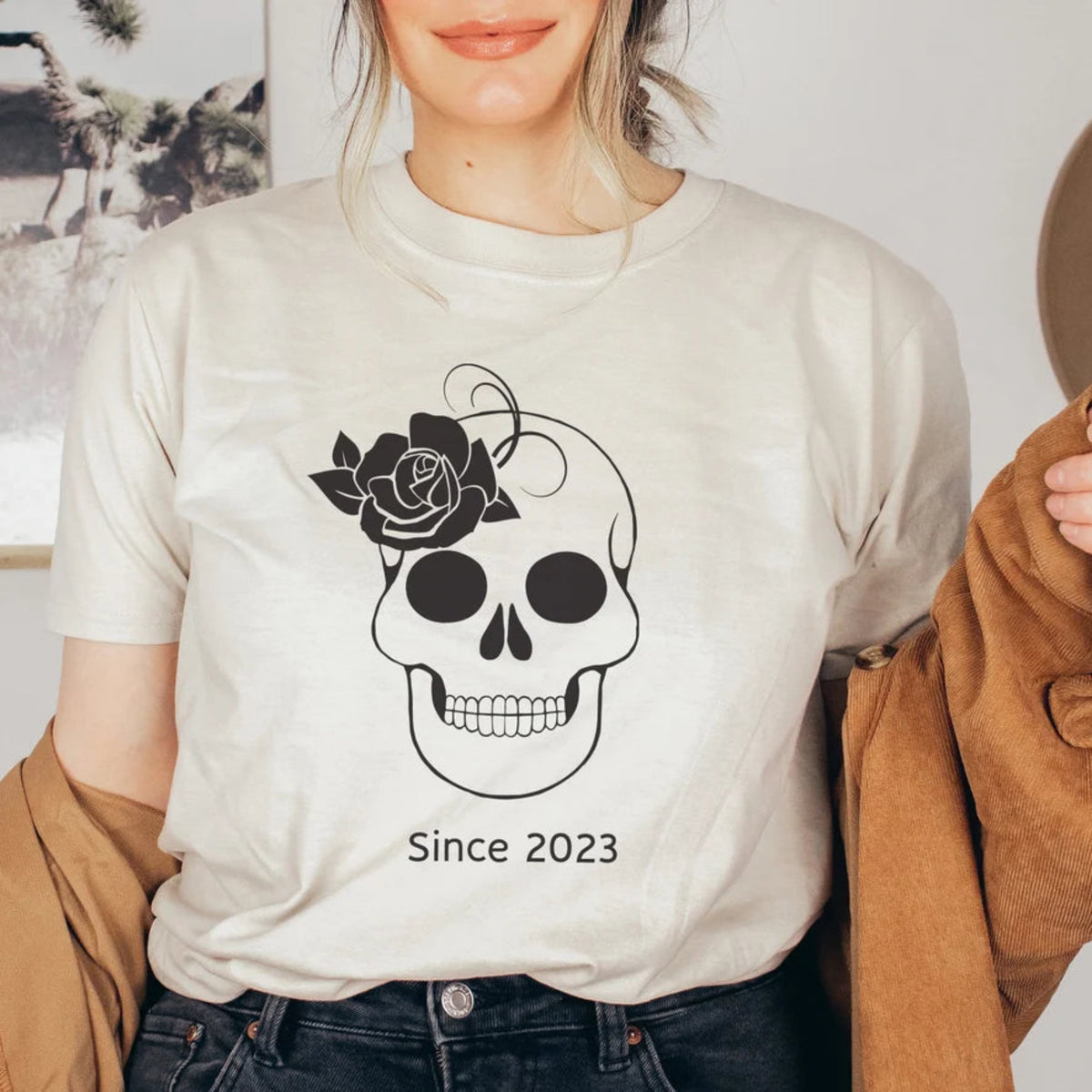 Natural color skull Halloween t-shirt with black rose, skeleton design, and Since 2023 graphic