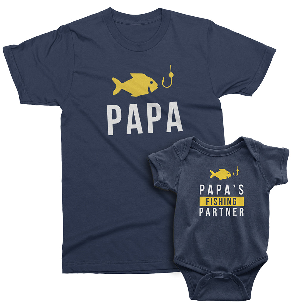 https://www.teelikeyours.com/cdn/shop/products/Papa_and_Papa_s_Fishing_Partner_short_sleeve_Graphic_Matching_T-Shirts_for_Grandpa_and_Grandchild_Navy_color_at_TeeLikeYours_com@2x.jpg?v=1569149597
