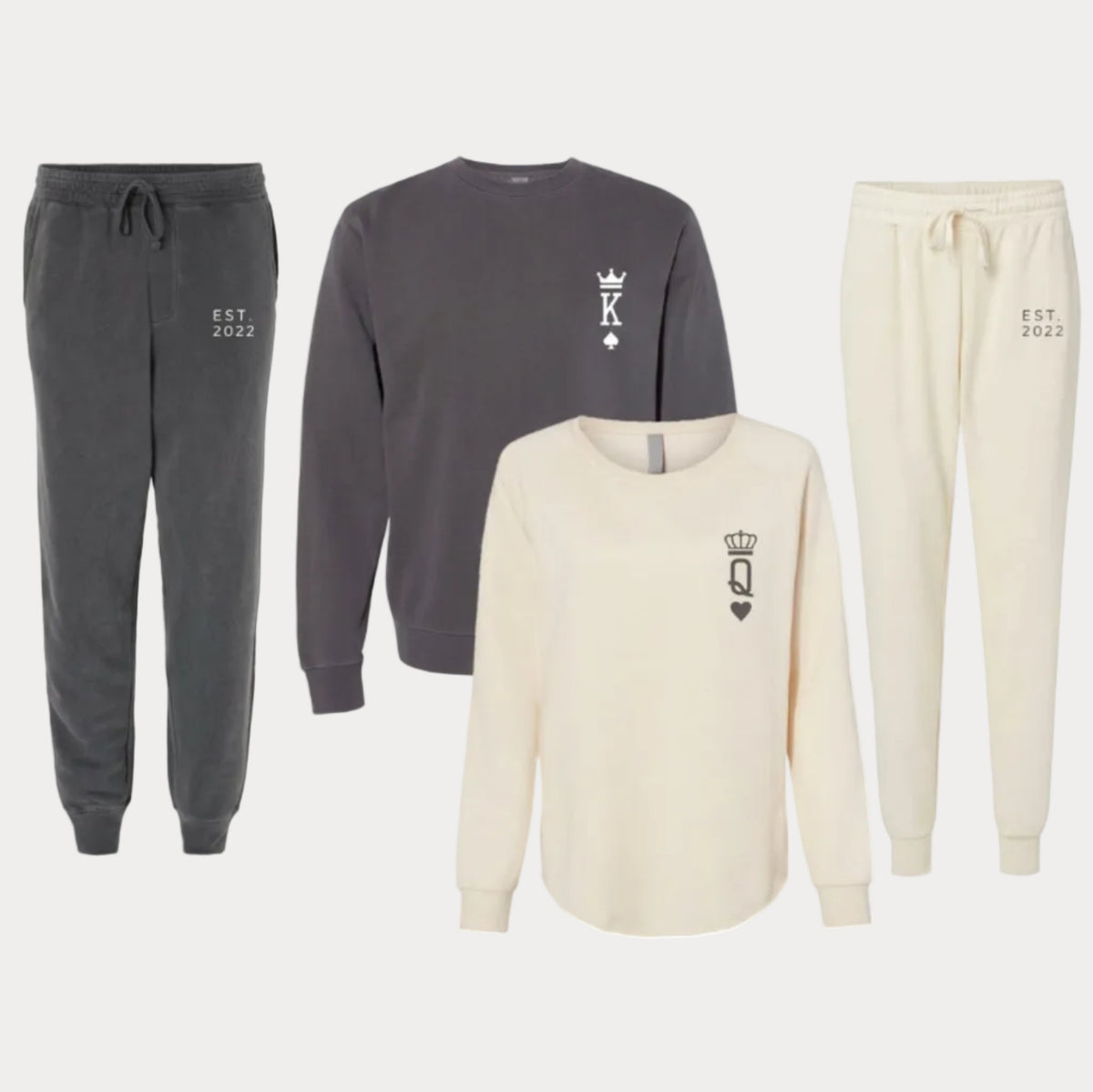 King and queen matching sweatshirt and joggers set featuring crown and playing card-inspired designs with EST. 2022 personalized details