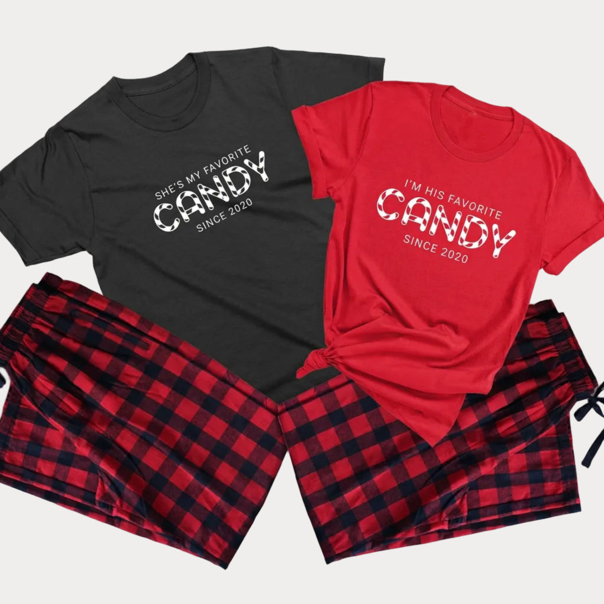 Personalized favorite candy matching Christmas pajamas for couples featuring She's My Favorite Candy and I'm His Favorite Candy T-shirts with matching flannel pajama pants.