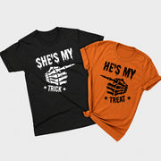 She's My Trick and He's My Treat matching Halloween shirts in black and autumn colors with skeleton hand graphics
